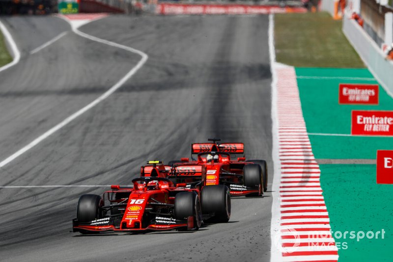 Charles Leclerc, Ferrari SF90, leads Sebastian Vettel, Ferrari SF90