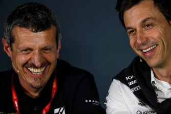 Guenther Steiner, Team Principal, Haas F1, and Toto Wolff, Executive Director (Business), Mercedes AMG, in the Team Principals Press Conference