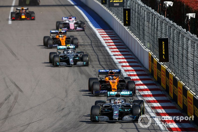 Lewis Hamilton, Mercedes AMG F1 W10, leads Carlos Sainz Jr., McLaren MCL34, Valtteri Bottas, Mercedes AMG W10, Lando Norris, McLaren MCL34, and Sergio Perez, Racing Point RP19