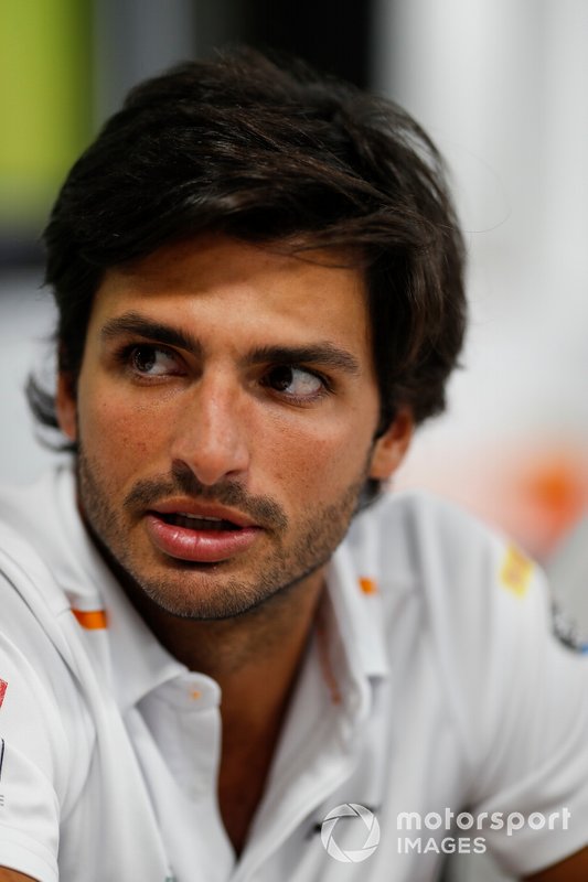 Carlos Sainz Jr., McLaren, talks to the media