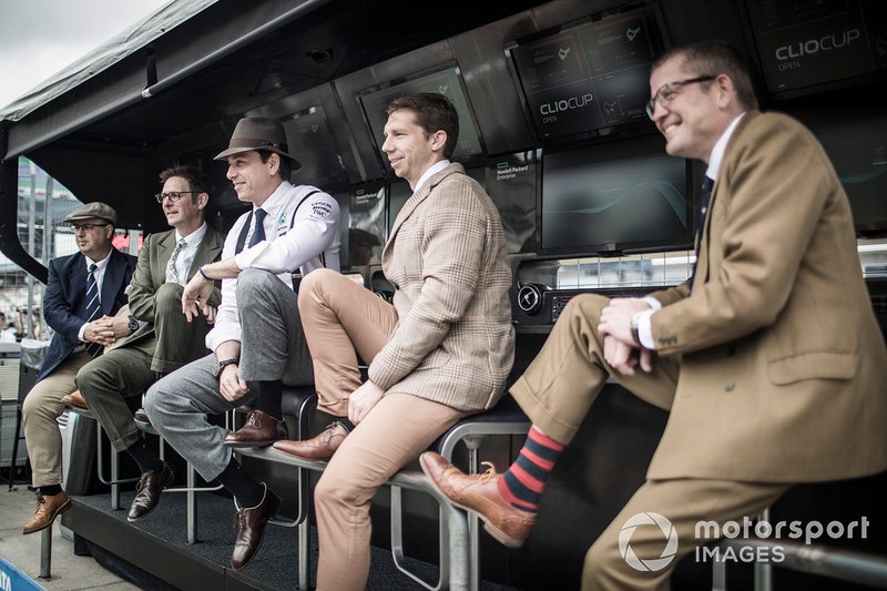 Ron Meadows, Sporting Director, Mercedes AMG, Andrew Shovlin, Chief Race Engineer, Mercedes AMG, Toto Wolff, Executive Director (Business), Mercedes AMG, and Matt Deane, Chief Mechanic, Mercedes AMG, on the pit wall in 1950s style clothing