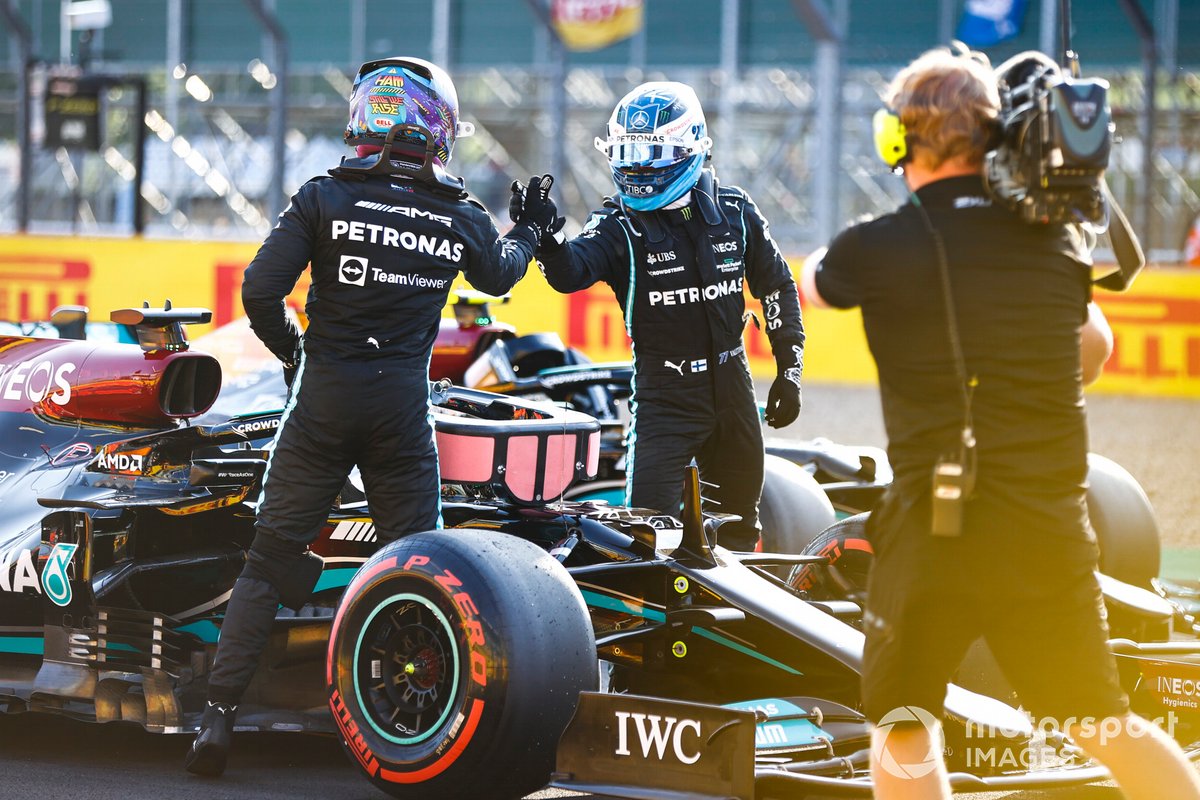 Valtteri Bottas, Mercedes, and pole man Lewis Hamilton, Mercedes, congratulate each other in Parc Ferme