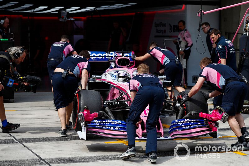 Sergio Perez, Racing Point RP19, is returned to the Racing Point garage