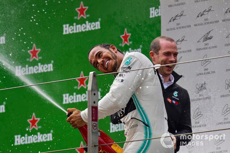 Lewis Hamilton, Mercedes AMG F1, 1st position, sprays Champagne on the podium