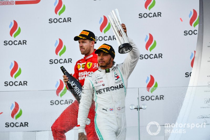 Lewis Hamilton, Mercedes AMG F1, 2nd position, leaves the podium with his trophy