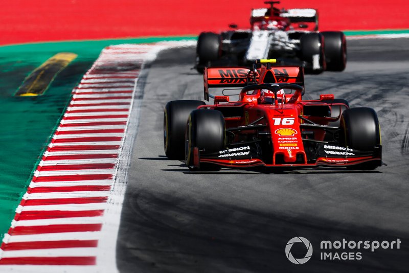 Charles Leclerc, Ferrari SF90, leads Kimi Raikkonen, Alfa Romeo Racing C38