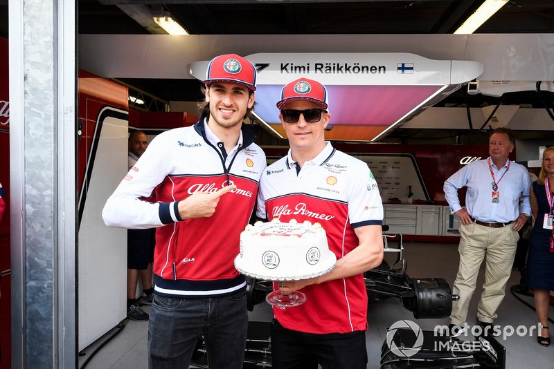 Kimi Raikkonen, Alfa Romeo Racing with a cake for his 300th GP celebrations with Antonio Giovinazzi, Alfa Romeo Racing