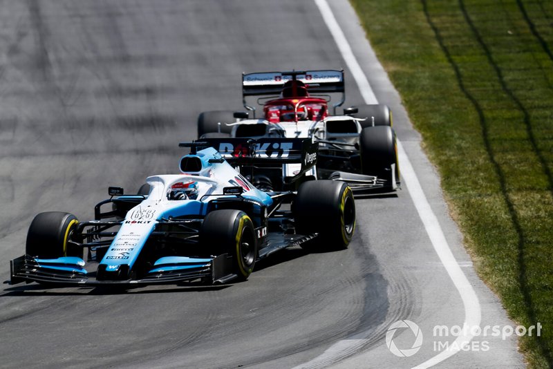 George Russell, Williams Racing FW42, leads Kimi Raikkonen, Alfa Romeo Racing C38