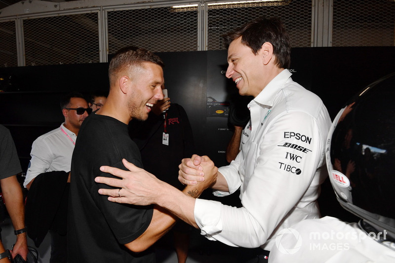 Lukas Podolski, Footballer and Toto Wolff, Mercedes AMG F1 Director of Motorsport