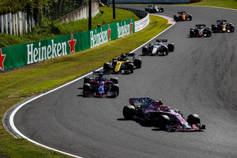 Esteban Ocon, Racing Point Force India VJM11, leads Brendon Hartley, Toro Rosso STR13, Carlos Sainz Jr., Renault Sport F1 Team R.S. 18, Charles Leclerc, Sauber C37, and Kevin Magnussen, Haas F1 Team VF-18