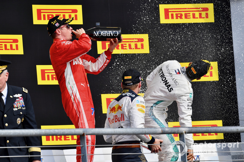 Podyum: 2. Max Verstappen, Red Bull Racing, Yarış galibi Kimi Raikkonen, Ferrari, 3. Lewis Hamilton, Mercedes AMG F1