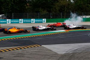 Sebastian Vettel, Ferrari SF71H spins after contact with Lewis Hamilton, Mercedes AMG F1 W09 on lap one 