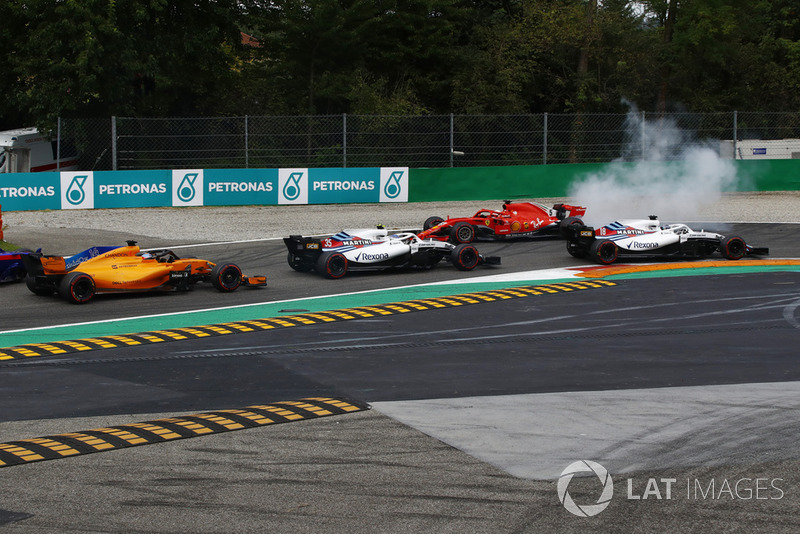 Sebastian Vettel, Ferrari SF71H spins after contact with Lewis Hamilton, Mercedes AMG F1 W09 on lap one