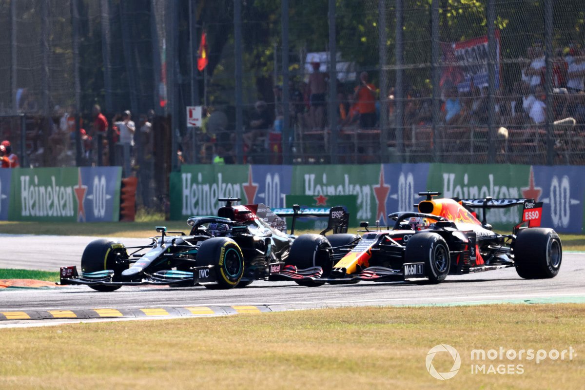 Lewis Hamilton, Mercedes W12, battles with Max Verstappen, Red Bull Racing RB16B