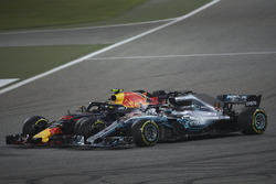 Lewis Hamilton, Mercedes AMG F1 W09, and Max Verstappen, Red Bull Racing RB14 Tag Heuer, make contact resulting in a puncture for the latter