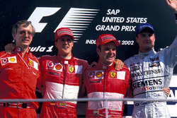 Podium: Paolo Martinelli, Ferrari Engine Director, second place Michael Schumacher, Ferrari, Race winner Rubens Barrichello, Ferrari, third place David Coulthard, McLaren