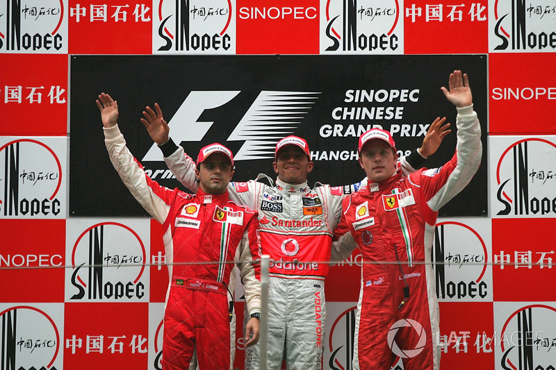 Podium: tweede Felipe Massa, Ferrari, winnaar Lewis Hamilton, McLaren, derde Kimi Raikkonen, Ferrari