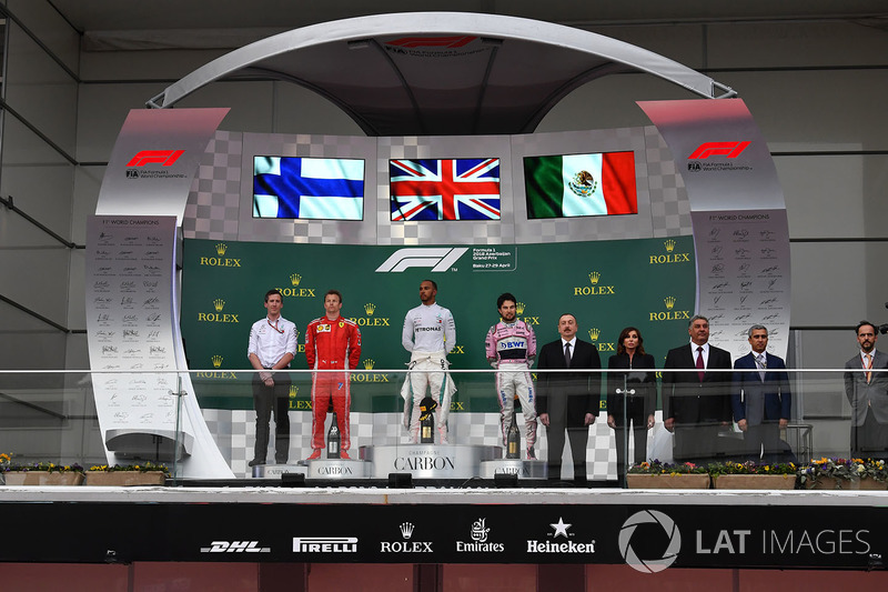 Kimi Raikkonen, Ferrari, Lewis Hamilton, Mercedes-AMG F1 and Sergio Perez, Force India on the podium