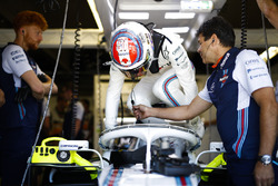 Lance Stroll, Williams Racing, enters his cockpit.