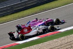 Charles Leclerc, Sauber C37 and Sergio Perez, Force India VJM11