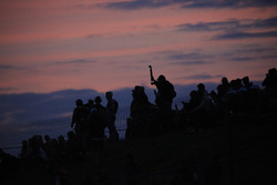 Fans at dusk