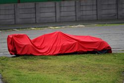 The Ferrari SF16-H of Kimi Raikkonen, Ferrari covered after he crashed out of the race