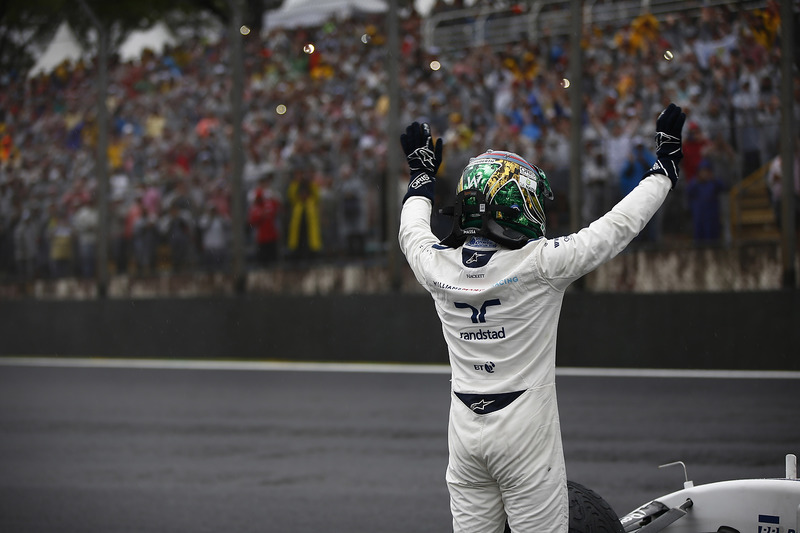 Felipe Massa, Williams, waves to his home fans after retiring from the race