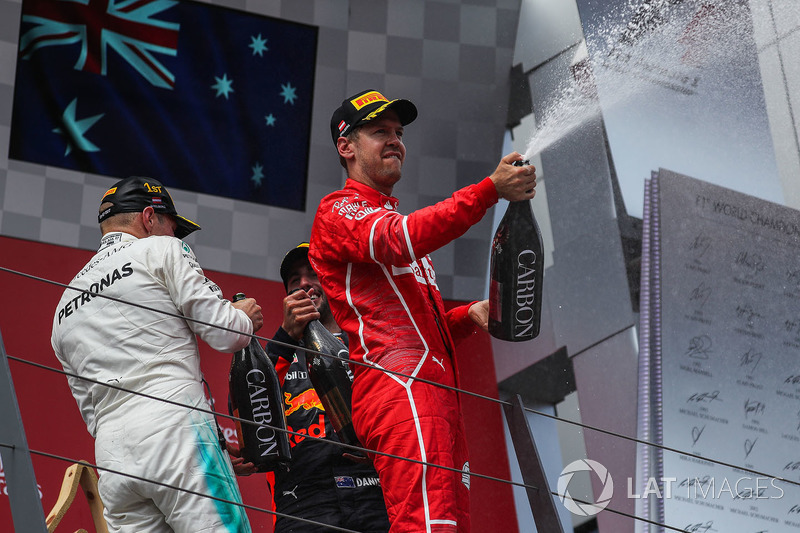 Podium: race winner Valtteri Bottas, Mercedes AMG F1, second place Sebastian Vettel, Ferrari, third 