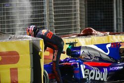 Daniil Kvyat, Scuderia Toro Rosso, climbs out of his car after crashing out