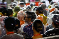 Fans endure the rain