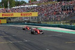 Pole sitter Sebastian Vettel, Ferrari SF70-H and Kimi Raikkonen, Ferrari SF70-H