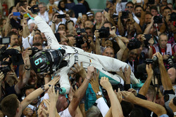 Second place and new world champion Nico Rosberg, Mercedes AMG Petronas F1 celebrates in parc ferme