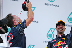 (L to R): Christian Horner, Red Bull Racing Team Principal celebrates on the podium by drinking cham