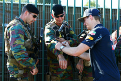 Max Verstappen, Red Bull Racing signs autographs for the armed guards