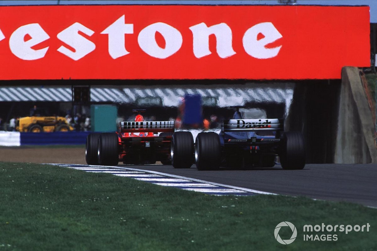 David Coulthard, McLaren MP4/15 Mercedes, Rubens Barrichello, Ferrari F1-2000