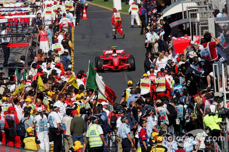 Race winner Kimi Raikkonen, Ferrari F2007 arrives in parc ferme  