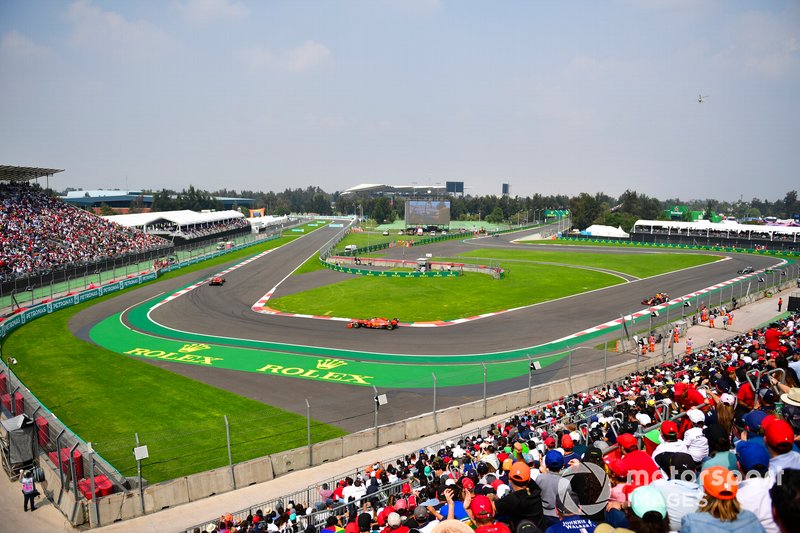 Charles Leclerc, Ferrari SF90, leads Sebastian Vettel, Ferrari SF90, and Alexander Albon, Red Bull RB15