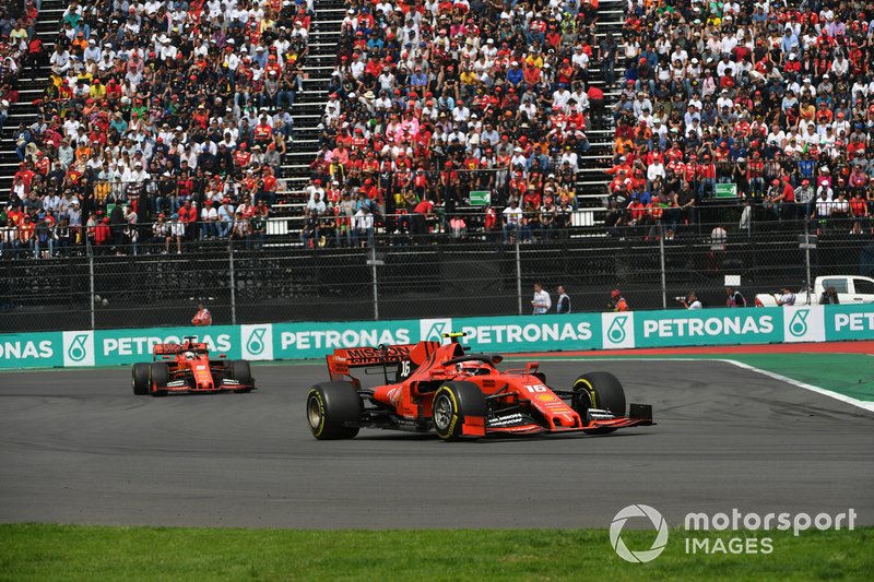 Charles Leclerc, Ferrari SF90, leads Sebastian Vettel, Ferrari SF90