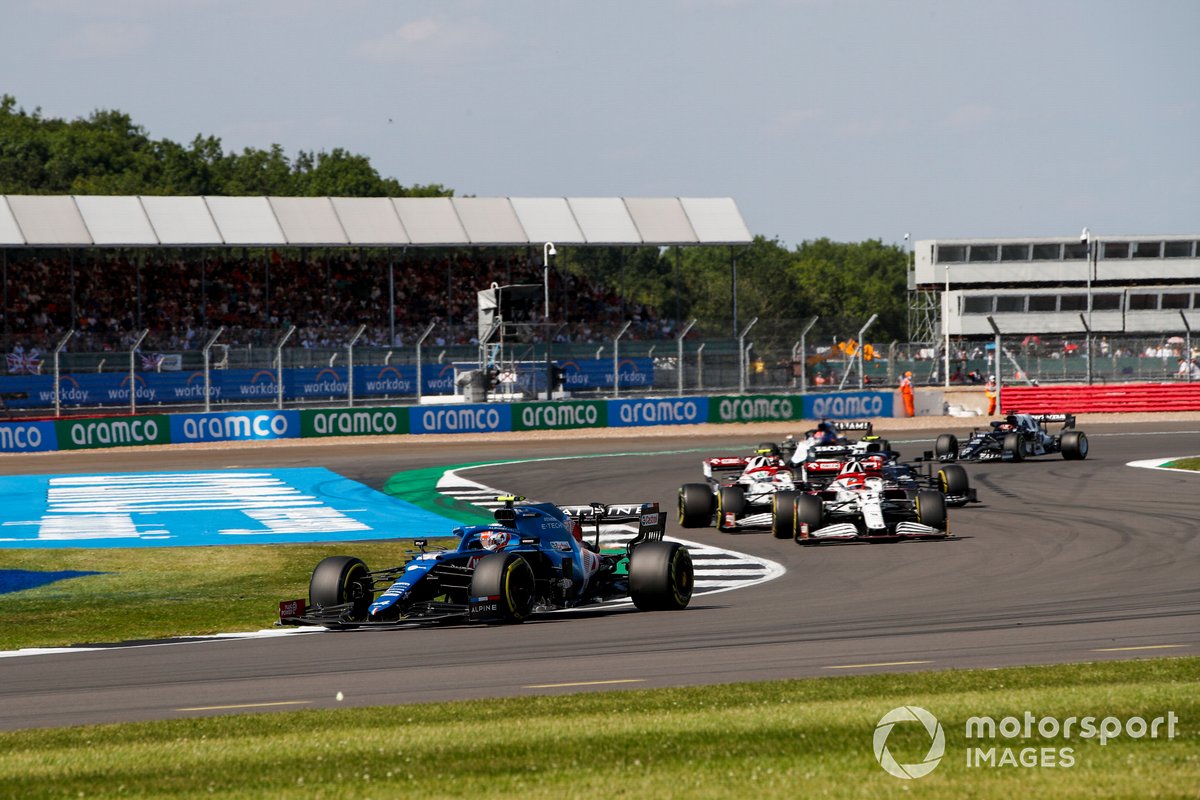Esteban Ocon, Alpine A521, Kimi Raikkonen, Alfa Romeo Racing C41, and Antonio Giovinazzi, Alfa Romeo Racing C41