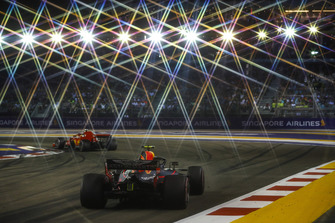 Sebastian Vettel, Ferrari SF71H, leads Max Verstappen, Red Bull Racing RB14