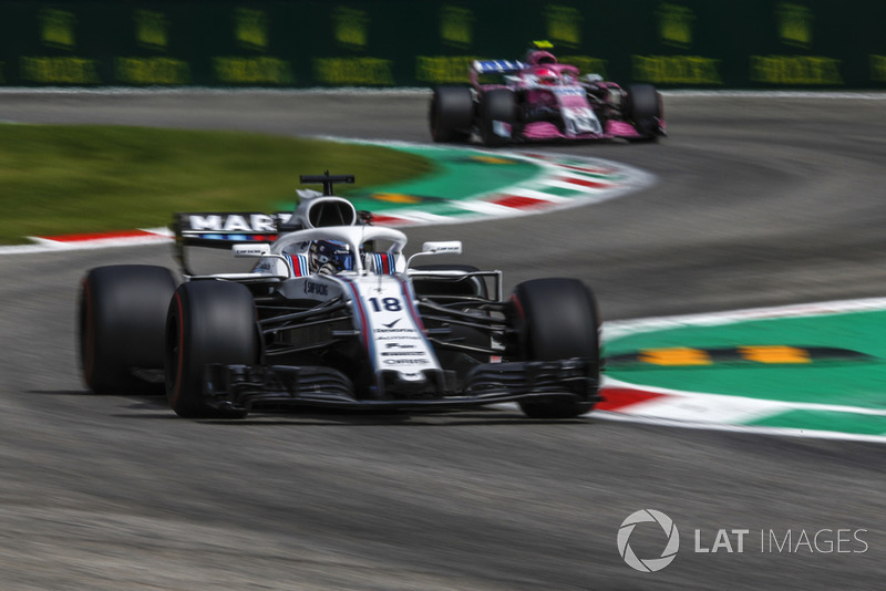 Lance Stroll, Williams FW41 and Esteban Ocon, Racing Point Force India VJM11 