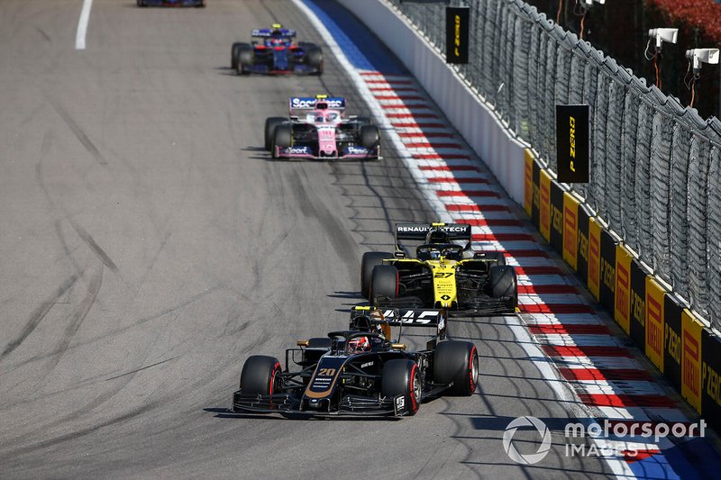 Kevin Magnussen, Haas F1 Team VF-19, leads Nico Hulkenberg, Renault F1 Team R.S. 19, and Lance Stroll, Racing Point RP19