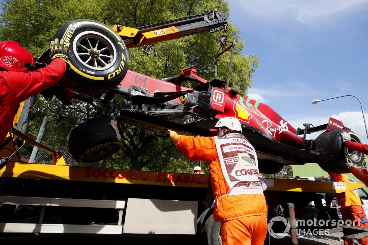 The car of Charles Leclerc, Ferrari SF21, is loaded onto a truck