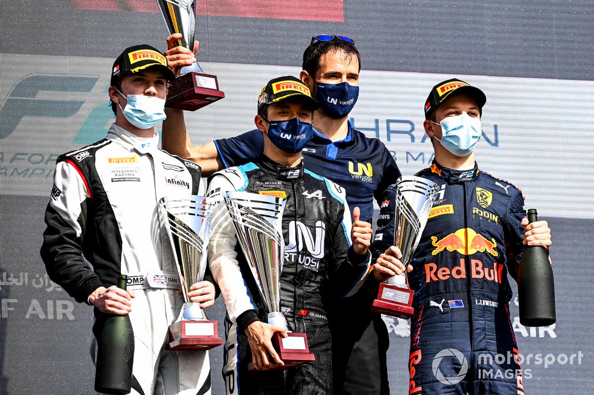 Dan Ticktum, Carlin, Race Winner Guanyu Zhou, Uni-Virtuosi Racing and Liam Lawson, Hitech Grand Prix celebrate on the podium with the trophy and the champagne