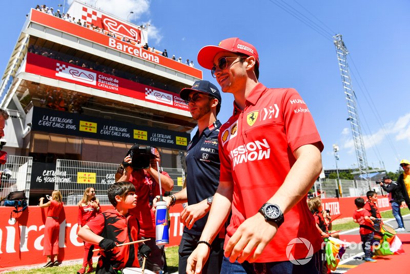 Pierre Gasly, Red Bull Racing, and Charles Leclerc, Ferrari, at the drivers parade