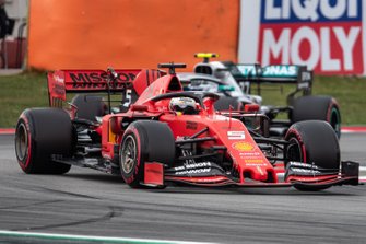 Sebastian Vettel, Ferrari SF90, leads Valtteri Bottas, Mercedes AMG W10