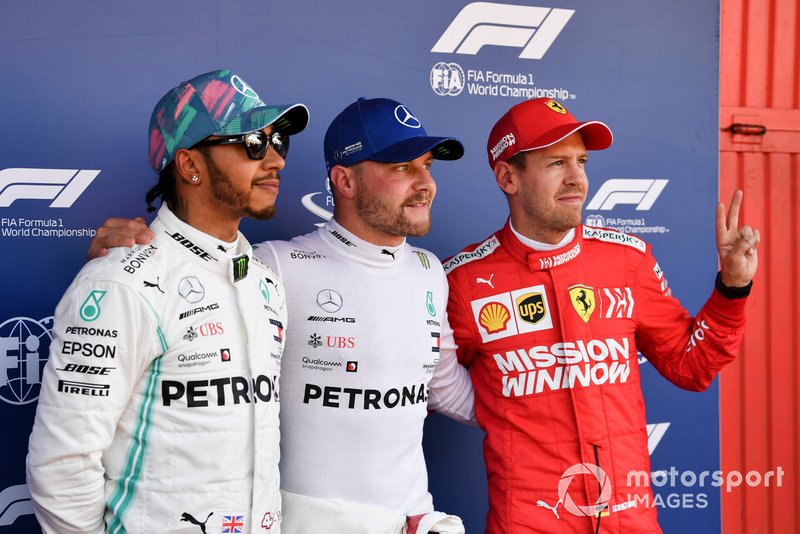 Top three Qualifiers, Lewis Hamilton, Mercedes AMG F1, pole man Valtteri Bottas, Mercedes AMG F1, and Sebastian Vettel, Ferrari