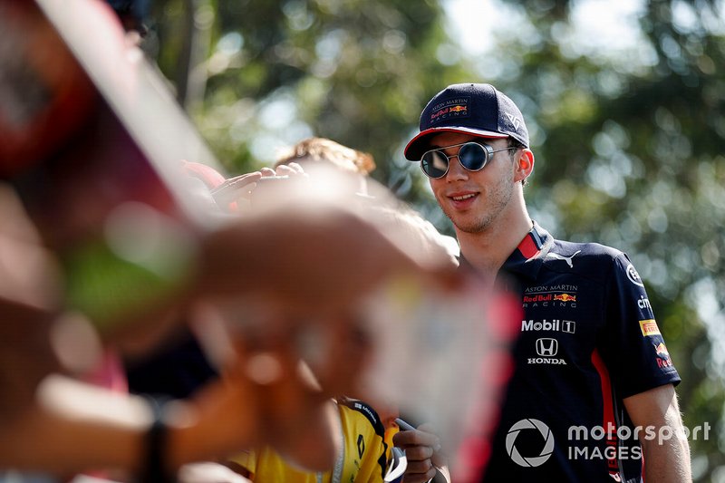 Pierre Gasly, Red Bull Racing signs autographs for fans