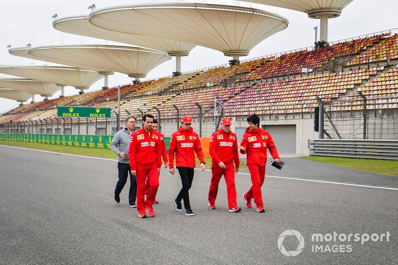 Charles Leclerc, Ferrari walks the track with his team