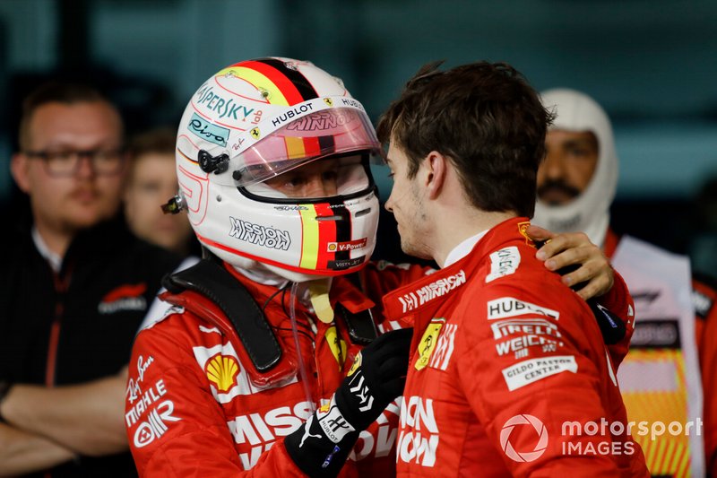 Sebastian Vettel, Ferrari, parla con il suo compagno di squadra Charles Leclerc, Ferrari, 3° classificato, dopo la gara